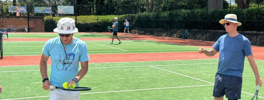Players hitting at a junior tennis afternoon at Lane Cove Tennis Club